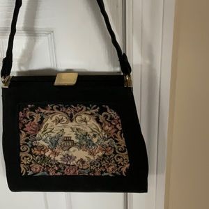 Very old vintage purse.  Black with small change purse attached inside